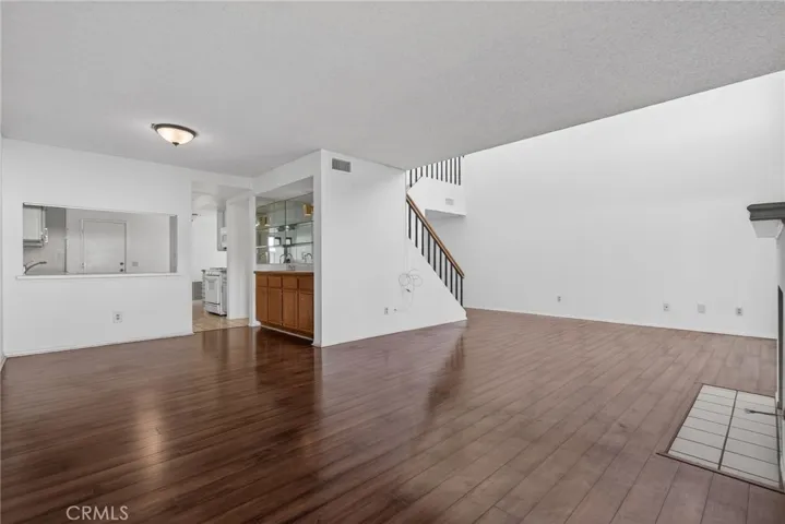 This is view of open living area unfurnished.