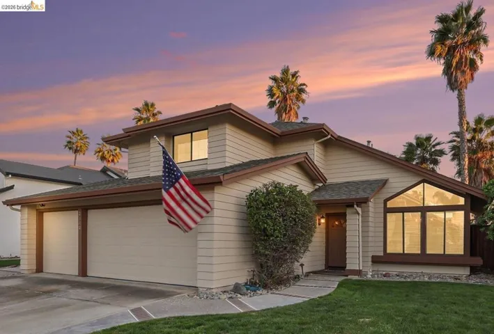 Back of property with a patio area, ceiling fan, a fenced backyard, stucco siding, and a chimney