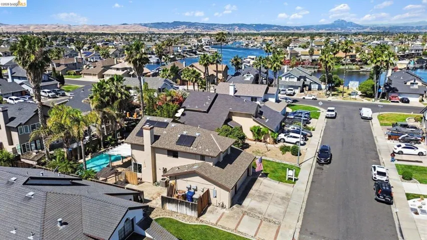 Aerial perspective showcasing a residential area with varied rooflines