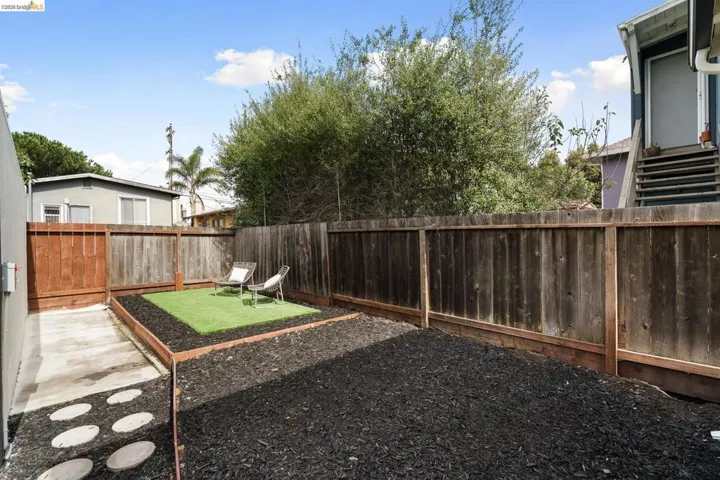 View of fenced backyard
