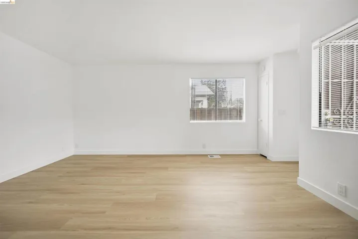 Unfurnished room featuring light wood-style floors
