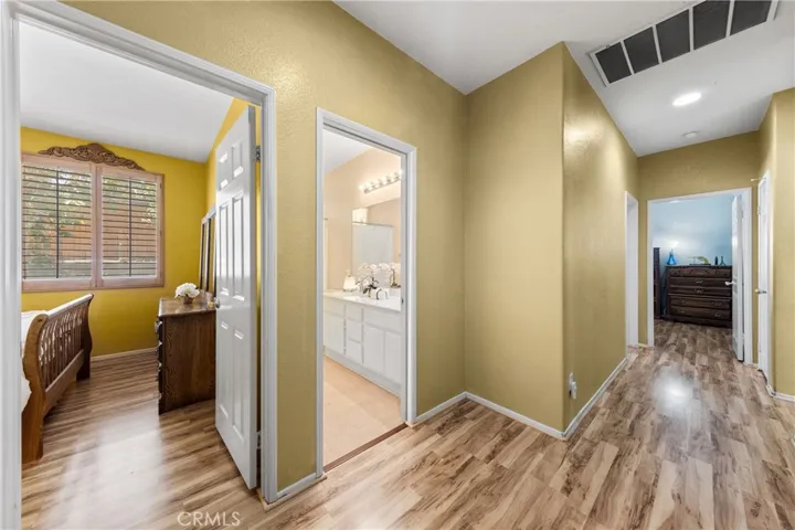 Layout separate from the primary suite for added peace and privacy.
