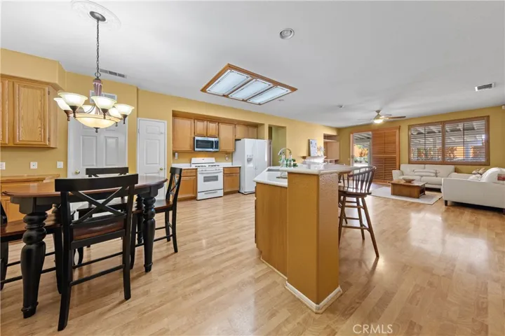 Stunning open-concept layout featuring a seamless flow between the gourmet kitchen and the spacious living area.