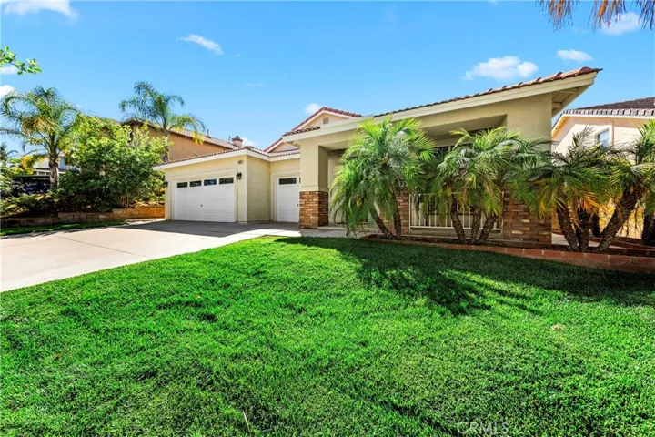 This home features excellent curb appeal with a well-maintained exterior and inviting front entry.