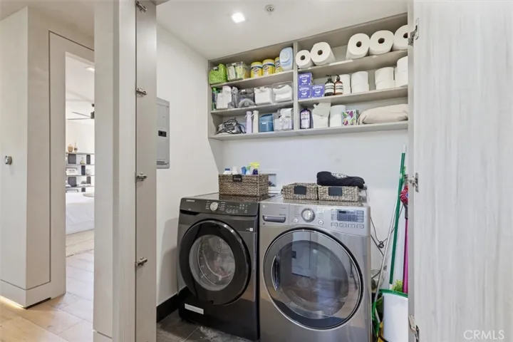 Laundry room on the second floor next to the bedrooms.