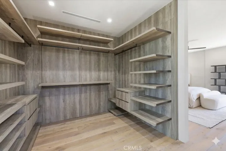 Walk thru primary closet.