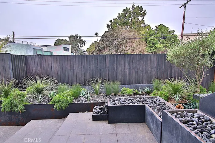 Private front porch area with waterfall.