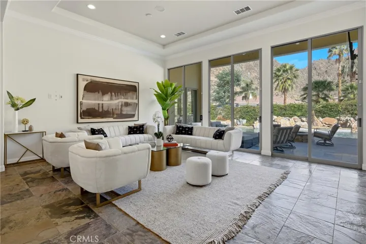 An inviting setting designed for conversation and entertaining, arranged at the heart of the home.