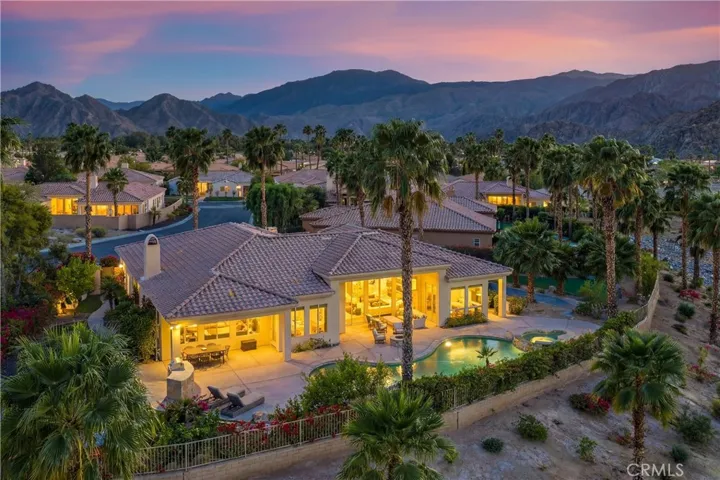 Evenings at White Fox Resort unfold around the saltwater pool, elevated spa, and cascading waterfalls set against dramatic mountain views. Located within the gated community of Hidden Canyon, adjacent to the iconic La Quinta Resort & Spa and surrounded by the Santa Rosa Mountains.