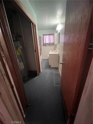 Main house bathroom with newer water heater