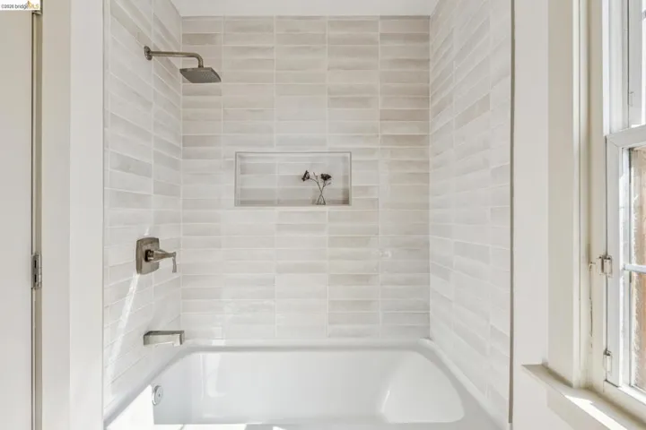 Bathroom featuring bathing tub / shower combination