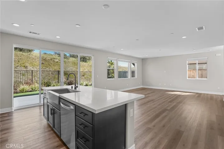 Kitchen With Living Room In Background
