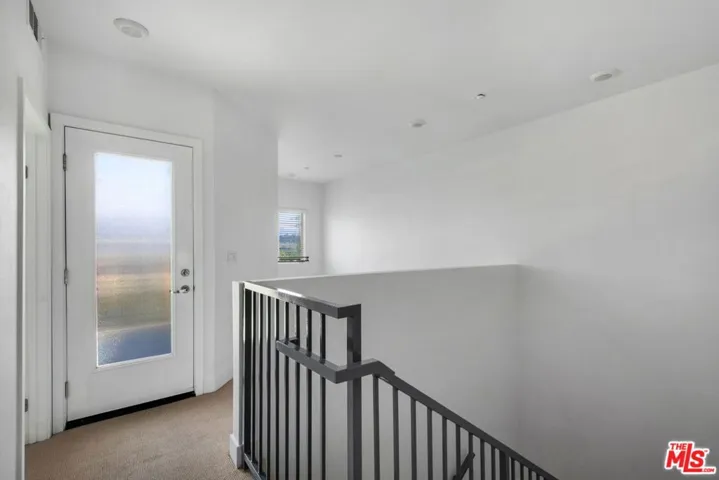 Staircase leading to 2nd level