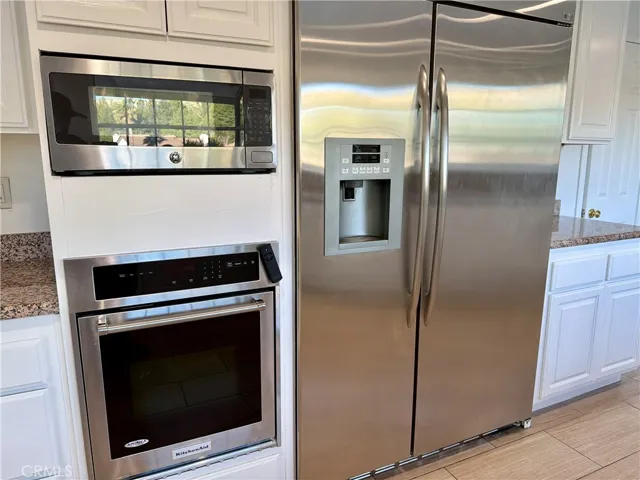 Oven, microwave, refrigerator.