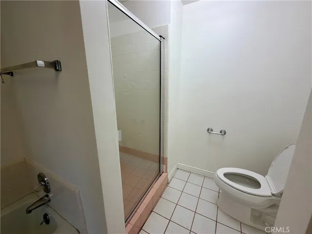 upstairs bathroom w/ tub and standup shower