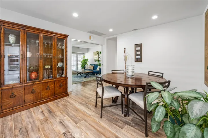 Dining room, looking back at living room. Pocket door divides them