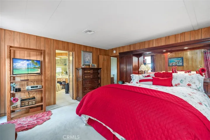 Primary Bedroom leads to en-suite bathroom.