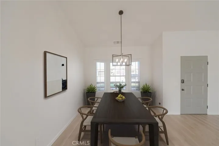 Dining Area (Disclaimer: Some images have been digitally enhanced with virtual staging to illustrate potential room layouts and furnishings. Actual property condition and features may vary. Buyer to verify all information independently).