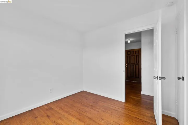 Empty room with wood finished floors