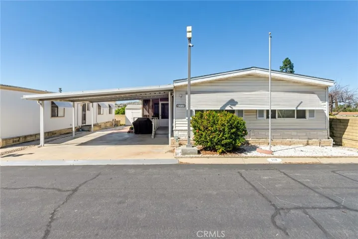 Front of the home with the carport