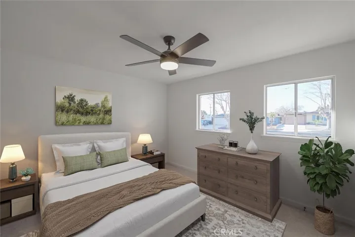 Primary Bedroom (Disclaimer: Some images have been digitally enhanced with virtual staging to illustrate potential room layouts and furnishings. Actual property condition and features may vary. Buyer to verify all information independently).