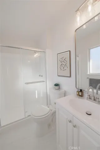 Primary Bathroom (Disclaimer: Some images have been digitally enhanced with virtual staging to illustrate potential room layouts and furnishings. Actual property condition and features may vary. Buyer to verify all information independently)