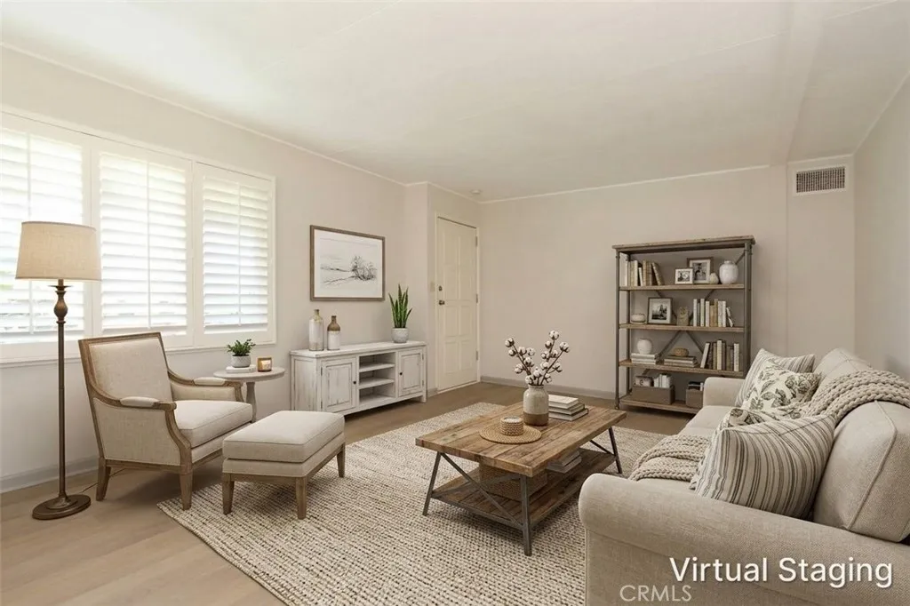 Virtually staged living room area with furniture removed Virtually staged living room area with furniture removed
