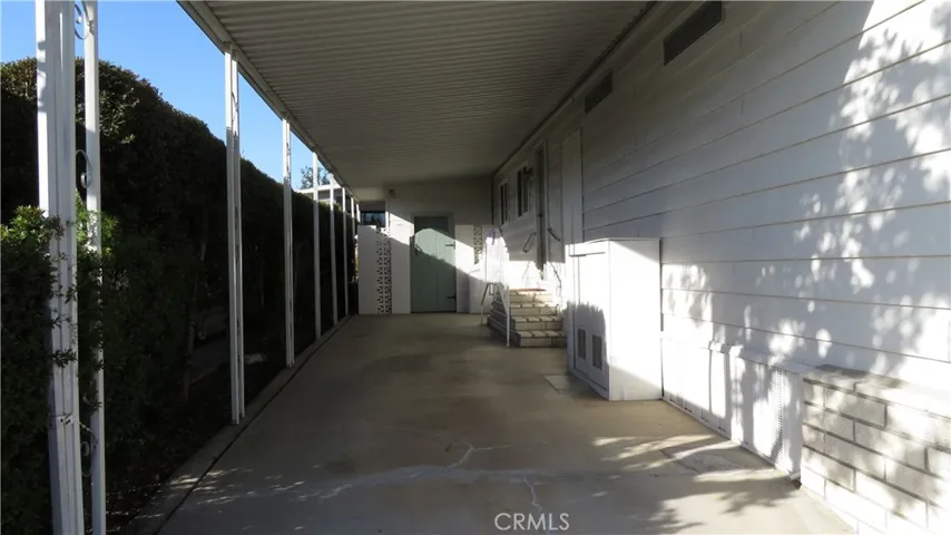 Attached Covered Carport & Storage Shed
