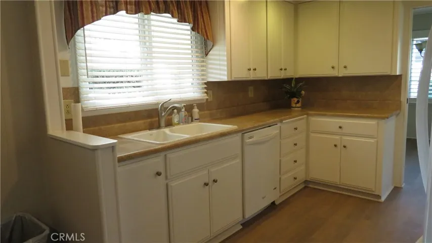 Kitchen Sink, Counter tops and Cabinets.