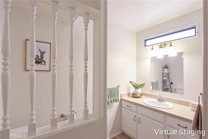 Virtually staged secondary bathroom