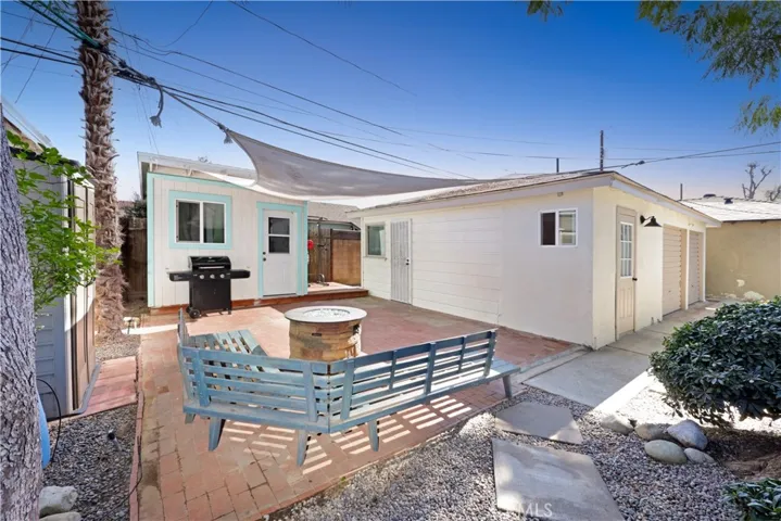 View of Patio, Shed (L), Recording Studio (Mid), Garages (far Right)