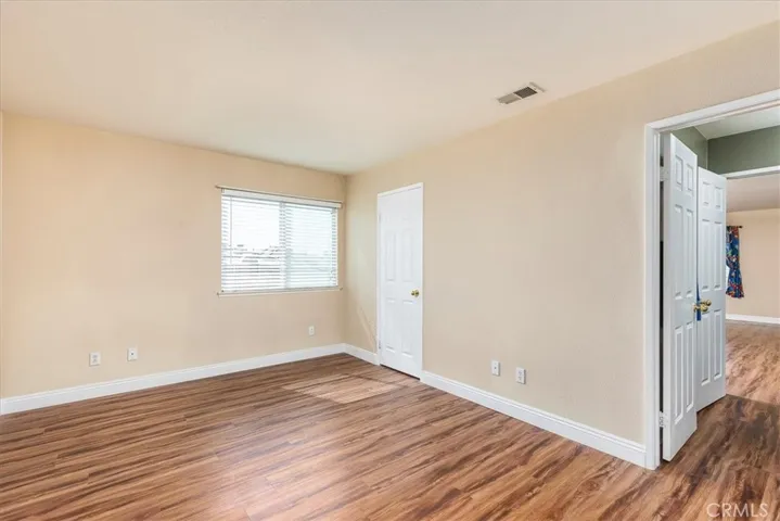 Upstairs bedroom with adjoining bath.