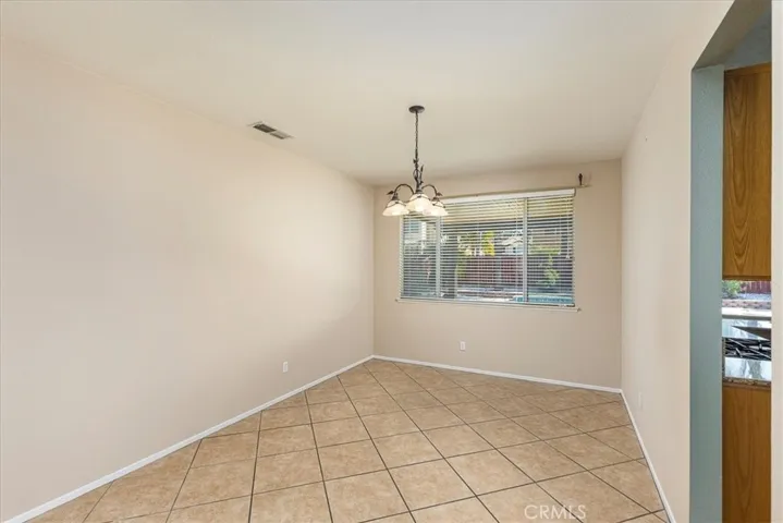 Dining area with entry into adjoining kitchen.