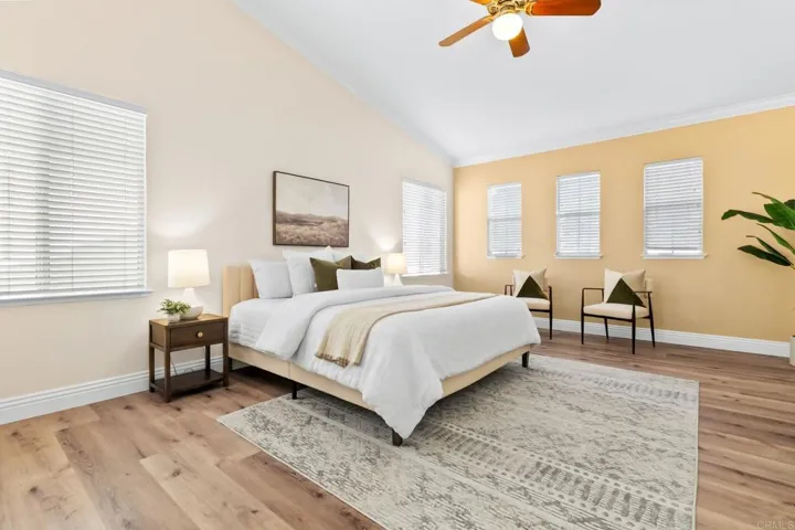 HUGE and Bright Upstairs Primary Bedroom with Vaulted Ceilings and Crown Molding