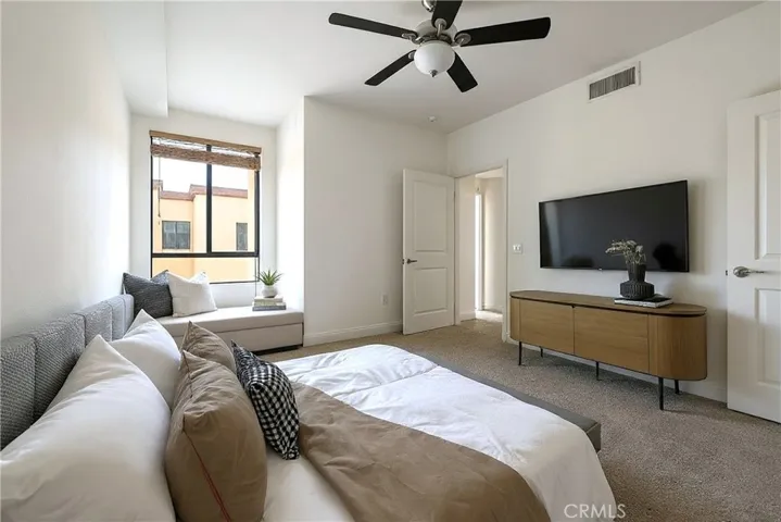 Virtually staged primary bedroom