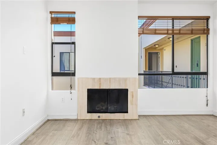 Living room with decorative fireplace