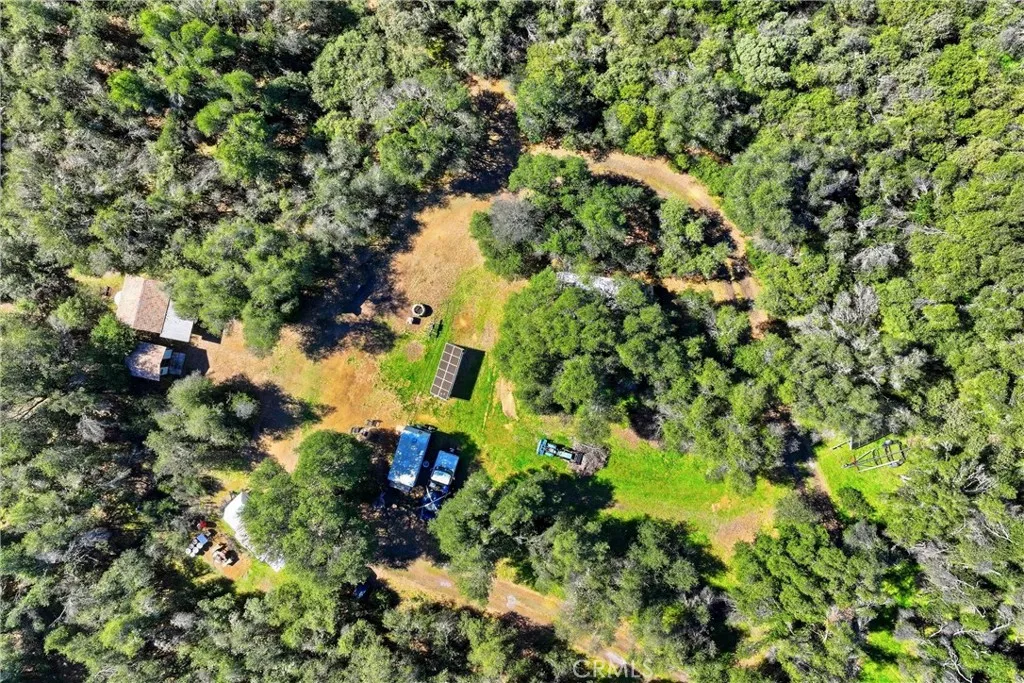 Beautiful with wrap around drive through property.