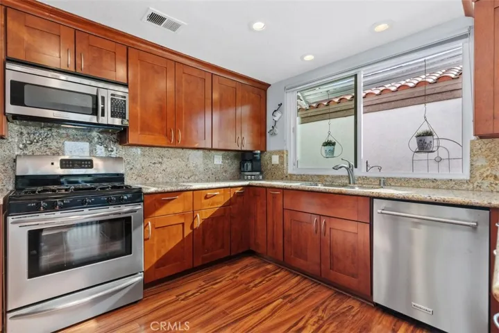 Kitchen has newer stainless steel appliances