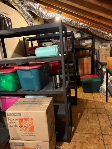 2nd Story Attic Storage Room #2 above garage & adjacent to loft