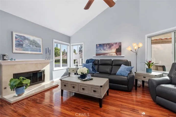 Living Room with Marble Faced Fireplace