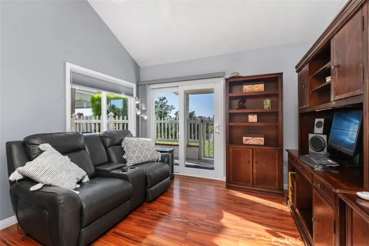 Den / Office area adjacent to kitchen with direct access to backyard patio area