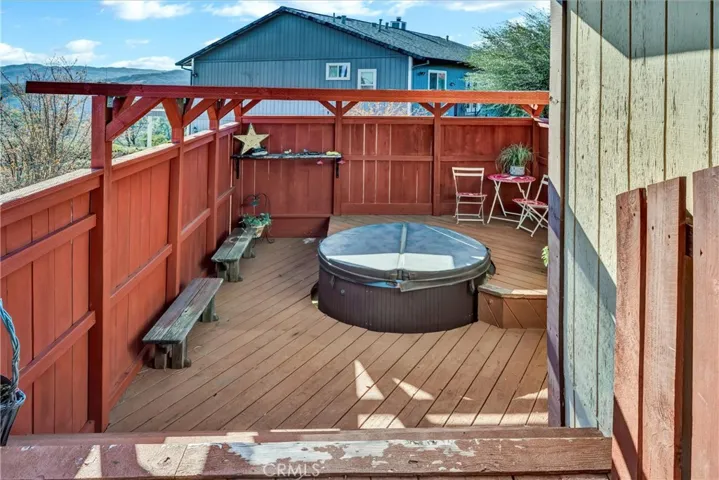 Lots of space for outdoor enjoyment, including this private hot tub area.
