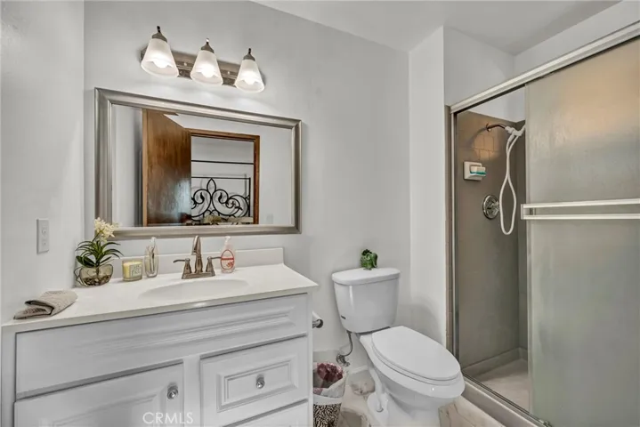 Primary bathroom with walk in shower.
