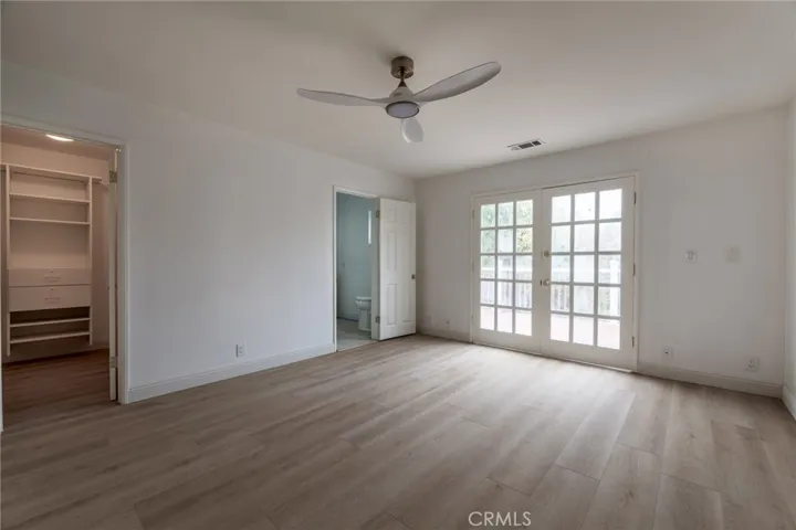 Primary Bedroom Looking at Doors to Deck