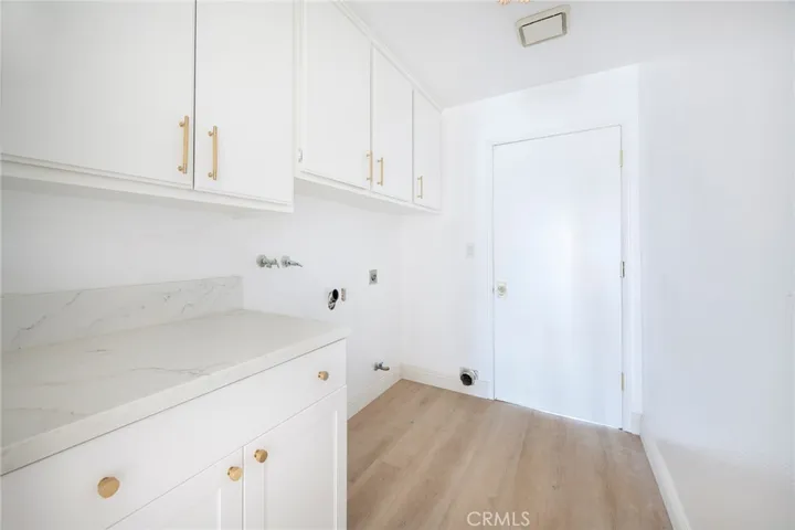 Direct Access into House from 2 Car Garage ithrough Laundry Room