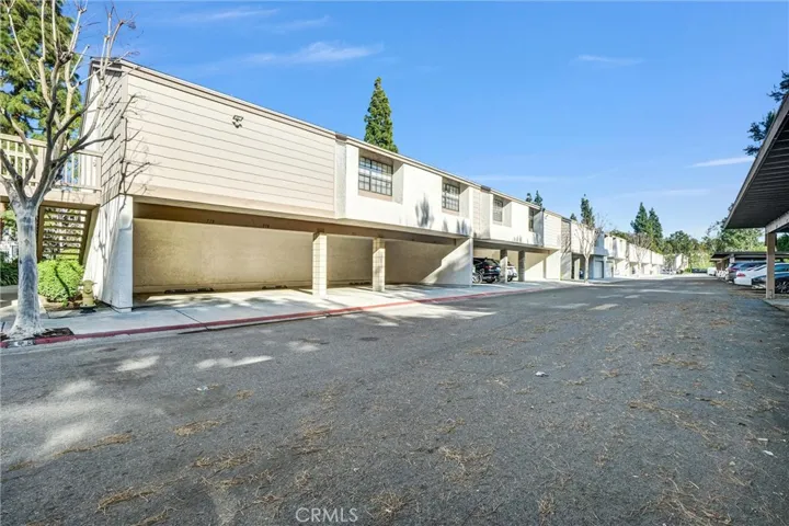 Carport under the building.