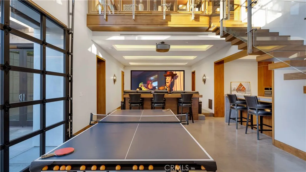 A media space, and a separate gym --family night will be a hit.
