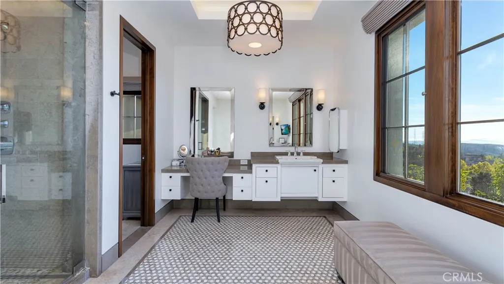 The spa-like master bath features a steam shower, rain shower and dual vanities. It's a perfect relaxation retreat.