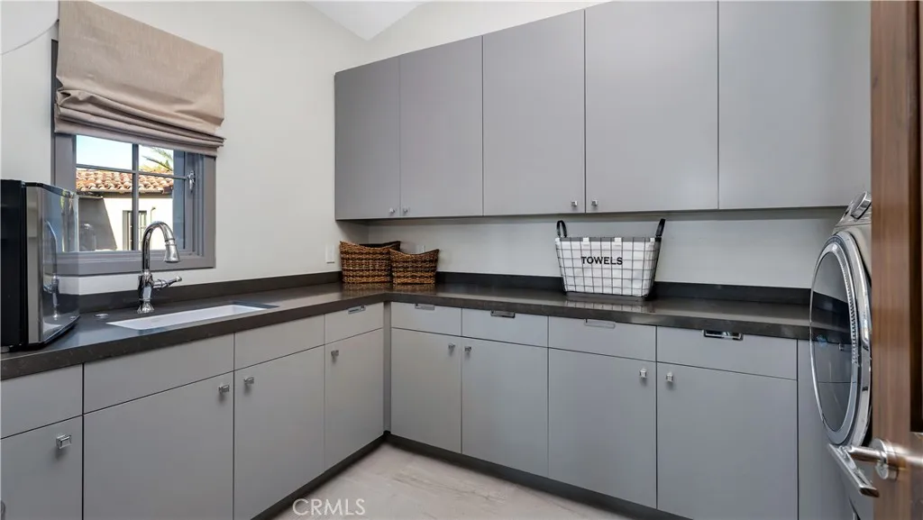 With a laundry room like this, you almost don't mind doing the laundry...almost
