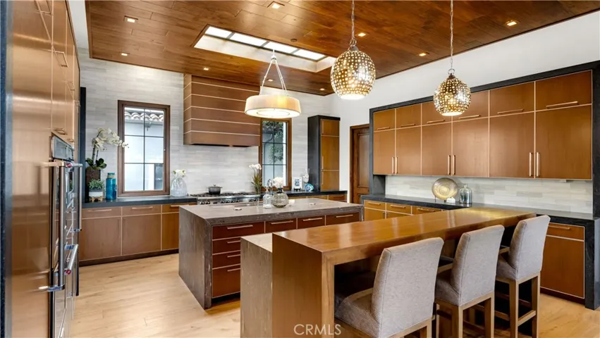 For even the pickiest gourmet, this kitchen doesn't disappoint--2 oversized islands, a breakfast bar, soft close cabinetry and weathered marble countertops, a unique choice to make this kitchen stand out.